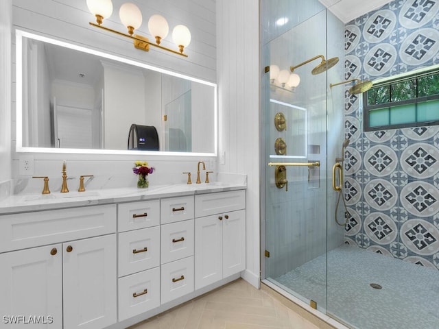 16970 Laurelin Ct, North Fort Myers, FL 33917 - bathroom featuring double vanity, a shower stall, and crown molding