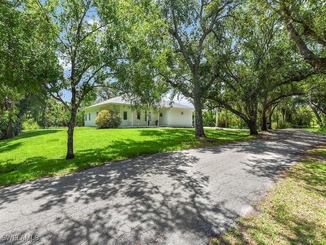 16970 Laurelin Ct, North Fort Myers, FL 33917 - view of front of home featuring a front lawn