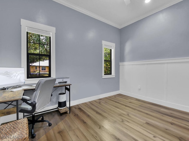 16970 Laurelin Ct, North Fort Myers, FL 33917 - office area with crown molding, wood finished floors, and a wainscoted wall
