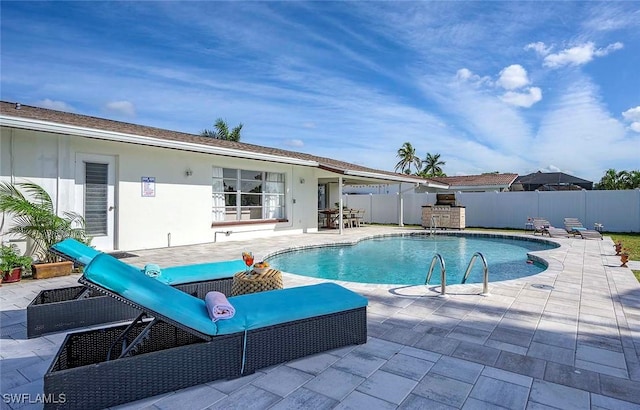1432 Wellington Ct, Cape Coral, FL 33904 - view of pool with a patio area and a fenced backyard
