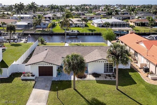 1432 Wellington Ct, Cape Coral, FL 33904 - aerial perspective of suburban area featuring a large body of water