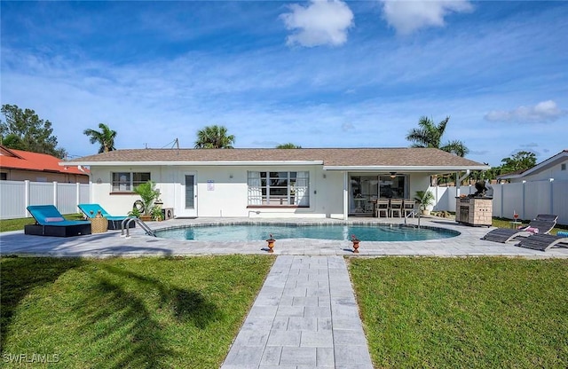1432 Wellington Ct, Cape Coral, FL 33904 - rear view of property with a patio and stucco siding