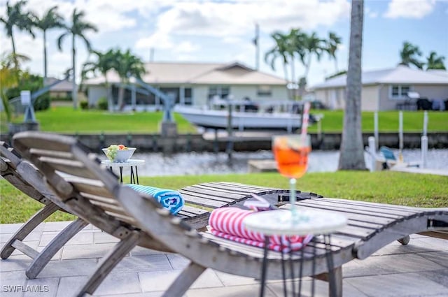 1432 Wellington Ct, Cape Coral, FL 33904 - surrounding community featuring a yard, a water view, and a residential view