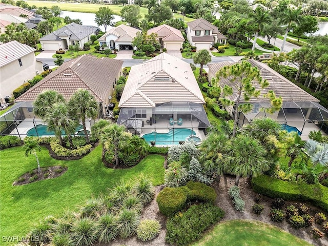 3181 Bramble Cove Ct, Fort Myers, FL 33905 - aerial perspective of suburban area featuring a pool and a large body of water