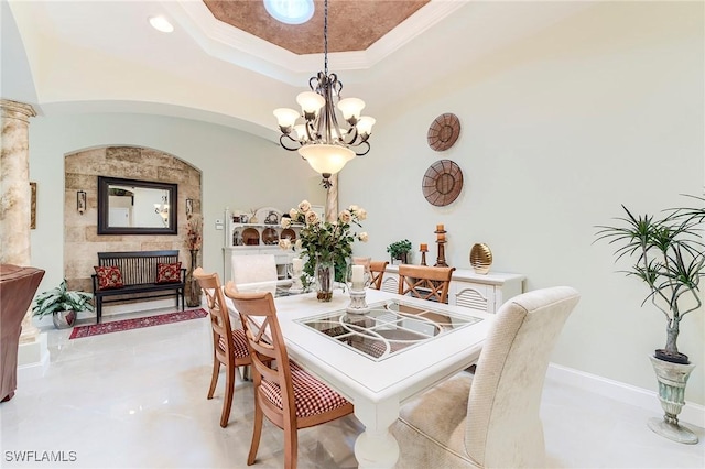 3181 Bramble Cove Ct, Fort Myers, FL 33905 - dining space featuring a chandelier, a tray ceiling, and a fireplace