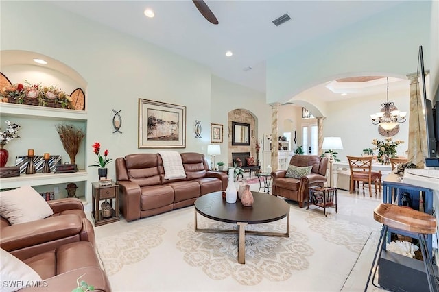 3181 Bramble Cove Ct, Fort Myers, FL 33905 - living area featuring arched walkways, ceiling fan, a chandelier, recessed lighting, and decorative columns