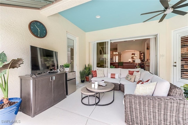 3181 Bramble Cove Ct, Fort Myers, FL 33905 - living area featuring ceiling fan, arched walkways, and tile patterned floors