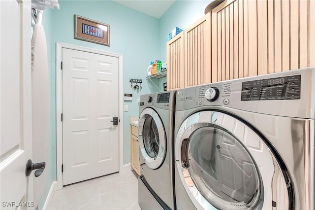 3181 Bramble Cove Ct, Fort Myers, FL 33905 - washroom with washing machine and clothes dryer and light tile patterned floors