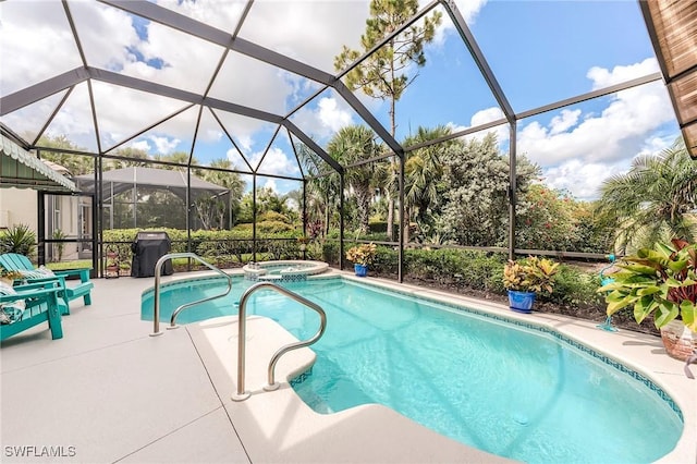 3181 Bramble Cove Ct, Fort Myers, FL 33905 - view of swimming pool featuring a patio area, a pool with connected hot tub, area for grilling, and glass enclosure