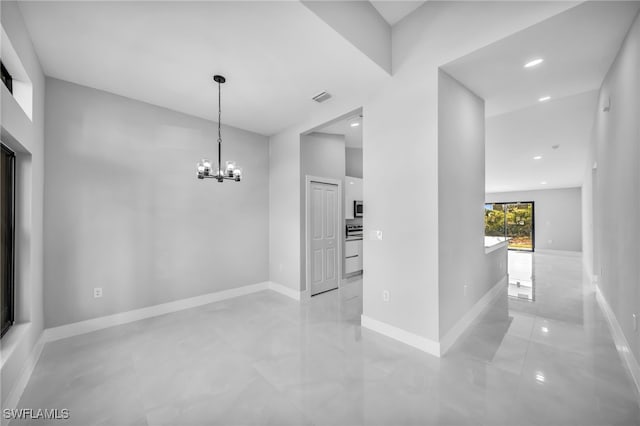 814 Edward Ave, Lehigh Acres, FL 33936 - unfurnished dining area with a chandelier