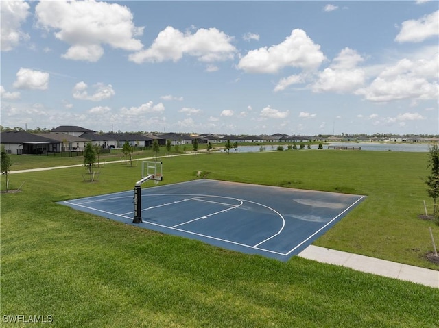 4005 Cavassa Ct, North Fort Myers, FL 33917 - view of sport court featuring community basketball court, a yard, a water view, and a residential view