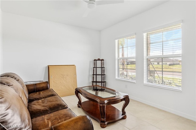 4005 Cavassa Ct, North Fort Myers, FL 33917 - sitting room featuring a ceiling fan, baseboards, and light tile patterned floors