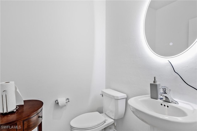 4005 Cavassa Ct, North Fort Myers, FL 33917 - bathroom with toilet and a sink