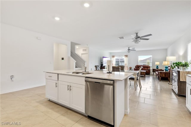 4005 Cavassa Ct, North Fort Myers, FL 33917 - kitchen with dishwasher, a sink, a ceiling fan, light countertops, and a kitchen island with sink