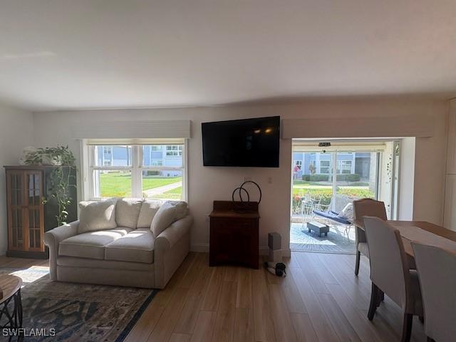 3358 N Key Dr Unit 2, North Fort Myers, FL 33903 - living room with wood finished floors