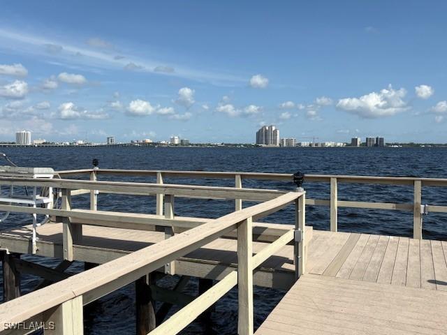 3358 N Key Dr Unit 2, North Fort Myers, FL 33903 - dock with a water view and a city view