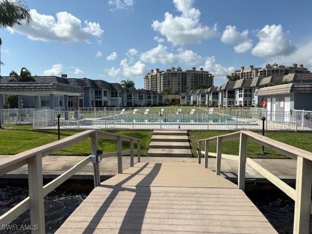 3358 N Key Dr Unit 2, North Fort Myers, FL 33903 - dock featuring a residential view