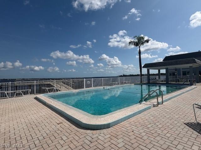 3358 N Key Dr Unit 2, North Fort Myers, FL 33903 - community pool with a patio area