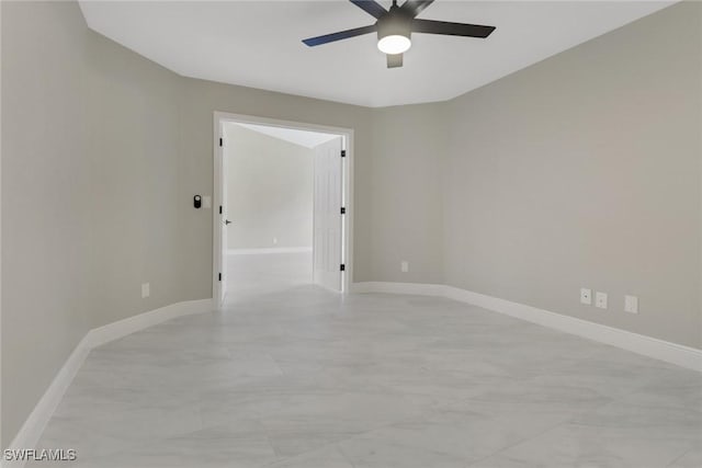 1118 SW 41st Ter, Cape Coral, FL 33914 - empty room featuring ceiling fan and baseboards