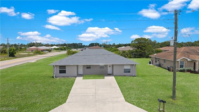2208/2210 Haviland Ave S, Lehigh Acres, FL 33973 - ranch-style house with driveway, a front lawn, and stucco siding