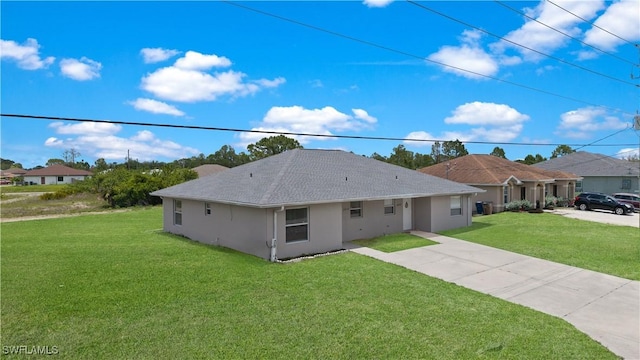 2208/2210 Haviland Ave S, Lehigh Acres, FL 33973 - view of front of property featuring a front lawn, stucco siding, roof with shingles, and driveway