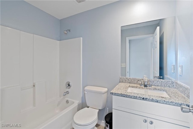 2208/2210 Haviland Ave S, Lehigh Acres, FL 33973 - bathroom featuring vanity, toilet, and tub / shower combination