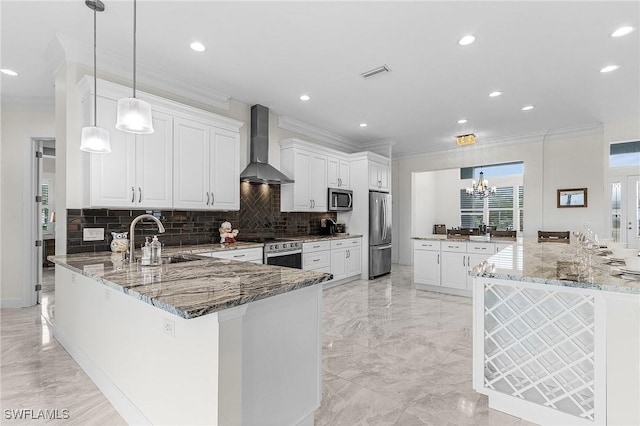 2228 SW 15th Ave, Cape Coral, FL 33991 - kitchen with wall chimney exhaust hood, stainless steel appliances, a sink, crown molding, and a peninsula