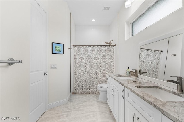 2228 SW 15th Ave, Cape Coral, FL 33991 - bathroom with double vanity, toilet, a shower with curtain, and baseboards