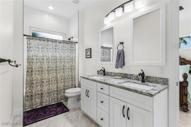 2228 SW 15th Ave, Cape Coral, FL 33991 - bathroom featuring double vanity, toilet, curtained shower, and marble finish floors
