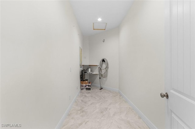 2228 SW 15th Ave, Cape Coral, FL 33991 - hallway with baseboards and attic access
