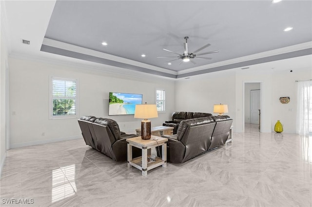 2228 SW 15th Ave, Cape Coral, FL 33991 - living area featuring a tray ceiling, ceiling fan, healthy amount of natural light, light marble finish flooring, and recessed lighting