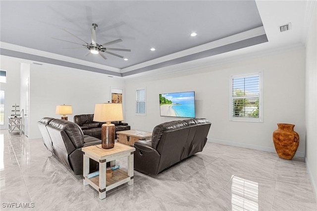 2228 SW 15th Ave, Cape Coral, FL 33991 - living room with a tray ceiling, light marble finish floors, crown molding, a ceiling fan, and recessed lighting