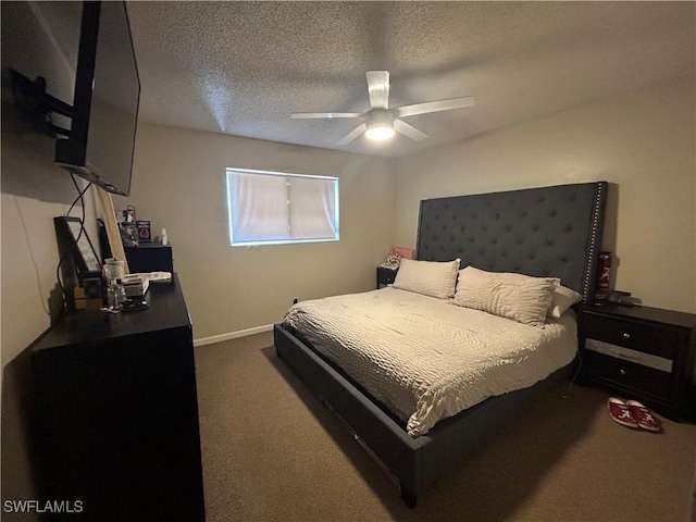 3303 Royal Canadian Trce Unit 4, Fort Myers, FL 33907 - carpeted bedroom with a textured ceiling, ceiling fan, and baseboards