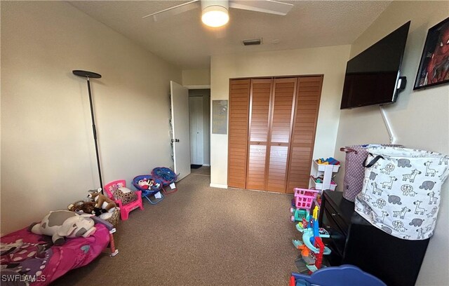 3303 Royal Canadian Trce Unit 4, Fort Myers, FL 33907 - playroom with a ceiling fan and carpet flooring