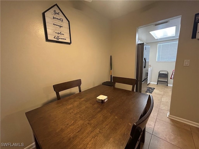 3303 Royal Canadian Trce Unit 4, Fort Myers, FL 33907 - dining area with tile patterned floors and baseboards
