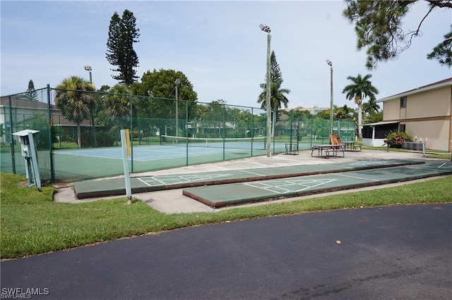 3303 Royal Canadian Trce Unit 4, Fort Myers, FL 33907 - view of tennis court with shuffleboard