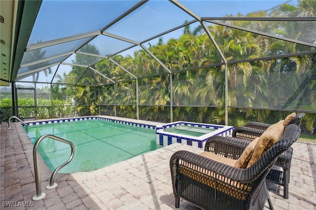 3604 Sudbury Ln, Bonita Springs, FL 34134 - view of pool with a pool with connected hot tub, a patio, and a lanai