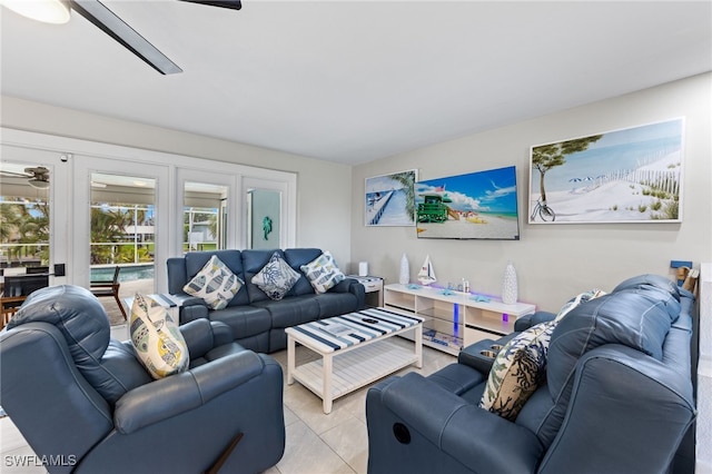 3117 SE 18th Ave, Cape Coral, FL 33904 - living room featuring a ceiling fan and light tile patterned floors