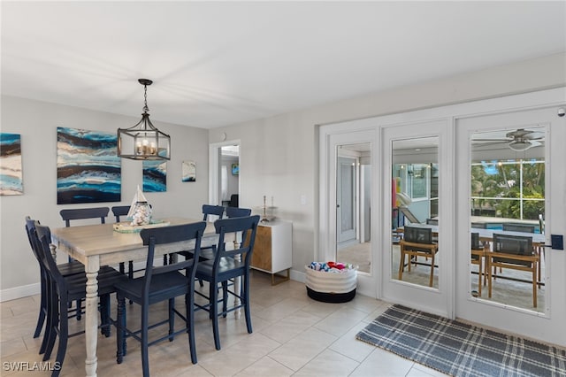 3117 SE 18th Ave, Cape Coral, FL 33904 - dining area featuring baseboards and light tile patterned floors
