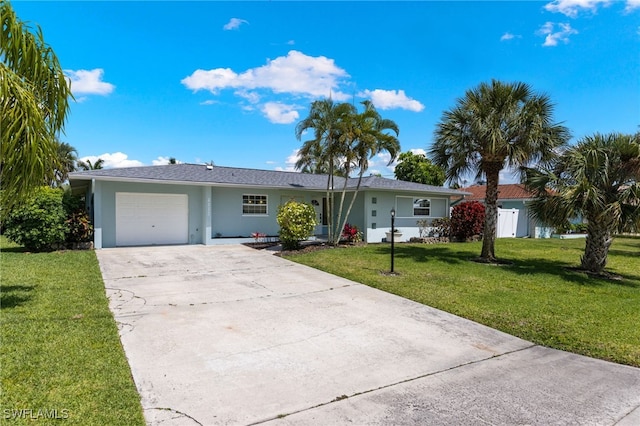 3117 SE 18th Ave, Cape Coral, FL 33904 - single story home featuring an attached garage, a front lawn, concrete driveway, and stucco siding