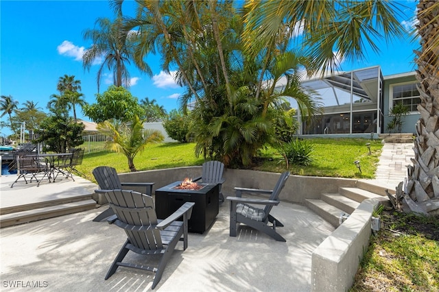 3117 SE 18th Ave, Cape Coral, FL 33904 - view of patio / terrace with a fire pit and a lanai