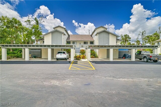17458 Blueberry Hill Dr Unit F, Fort Myers, FL 33908 - view of property with covered parking