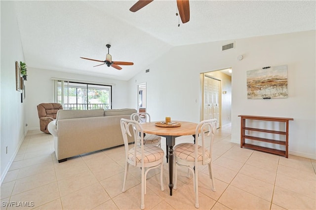 17458 Blueberry Hill Dr Unit F, Fort Myers, FL 33908 - dining area featuring a ceiling fan, lofted ceiling, light tile patterned floors, and baseboards