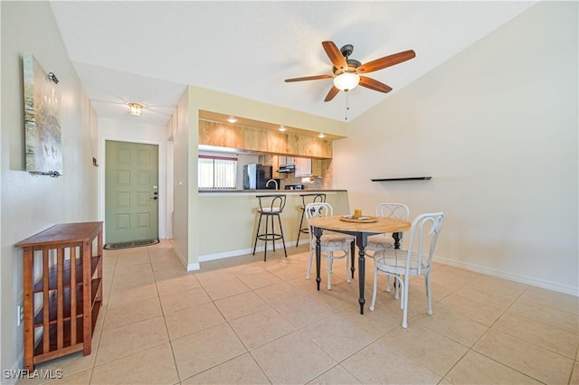 17458 Blueberry Hill Dr Unit F, Fort Myers, FL 33908 - dining space with a ceiling fan, light tile patterned flooring, and baseboards