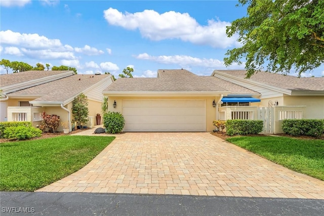 15657 Carriedale Ln, Fort Myers, FL 33912 - single story home featuring stucco siding, a garage, and decorative driveway