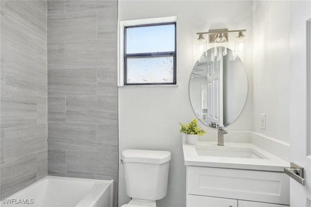4906 5th St W, Lehigh Acres, FL 33971 - full bathroom with vanity, toilet, and shower / washtub combination
