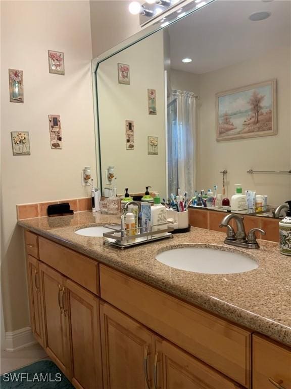1108 Lee Ave, Lehigh Acres, FL 33972 - bathroom featuring double vanity