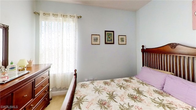 1108 Lee Ave, Lehigh Acres, FL 33972 - bedroom featuring multiple windows