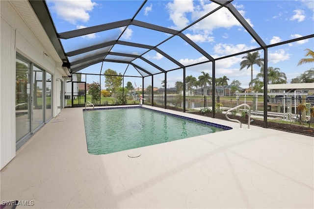 4969 Vincennes St, Cape Coral, FL 33904 - swimming pool with a patio area and glass enclosure