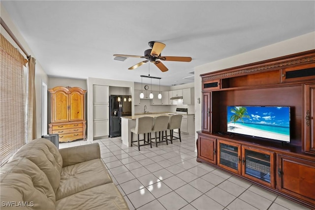 4969 Vincennes St, Cape Coral, FL 33904 - living room featuring light tile patterned floors and ceiling fan